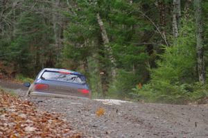Piotr Fetela / Ray Vambuts in their Subaru Impreza STi catch air on SS13 (Herman 1)
