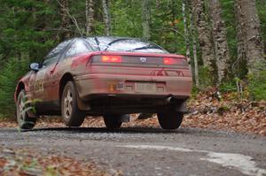 Erik Hill / Oliver Cooper in their Eagle Talon catch air on SS13 (Herman 1)