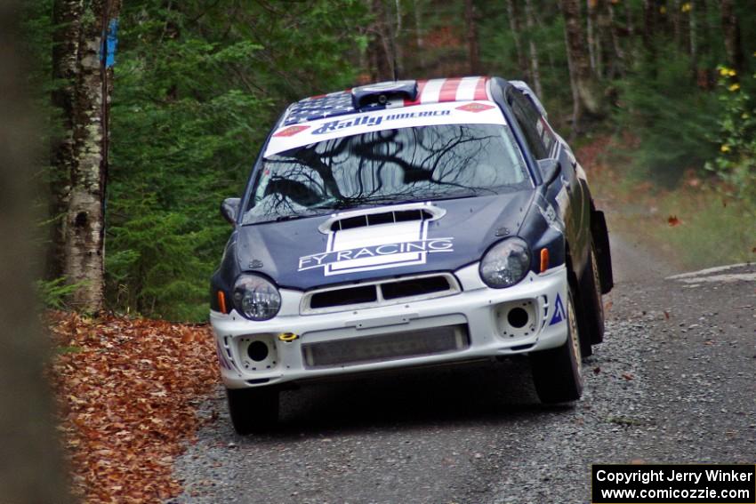 Adam Yeoman / Jordan Schulze in their Subaru Impreza catch air on SS13 (Herman 1)