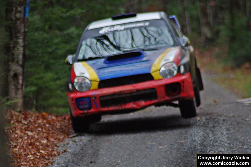 Janusz Topor / Michal Kaminski in their Subaru WRX STi catch air on SS13 (Herman 1)