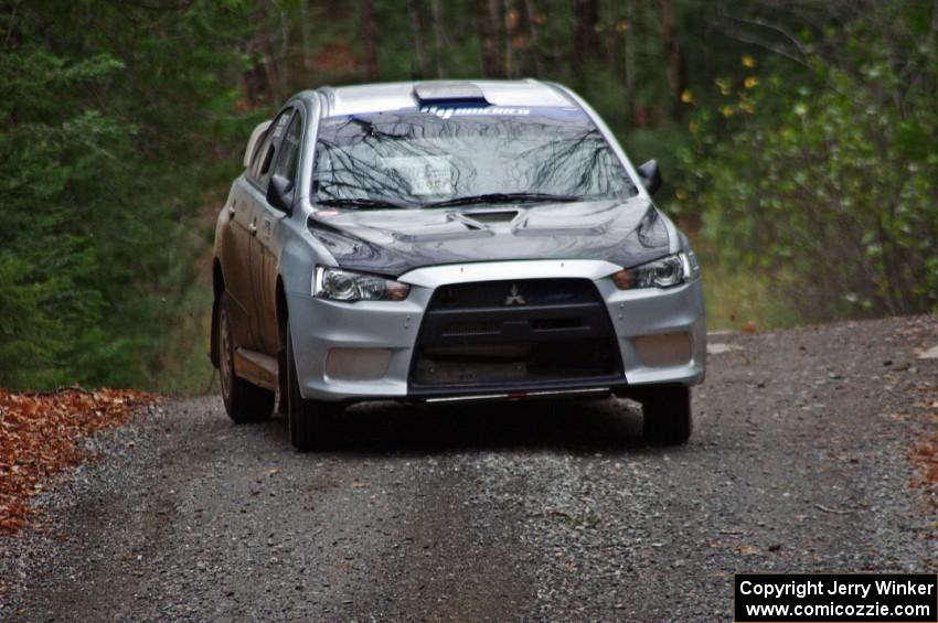 Vio Dobasu / Nathalie Richard in their Mitsubishi Lancer Evo X on SS13 (Herman 1)