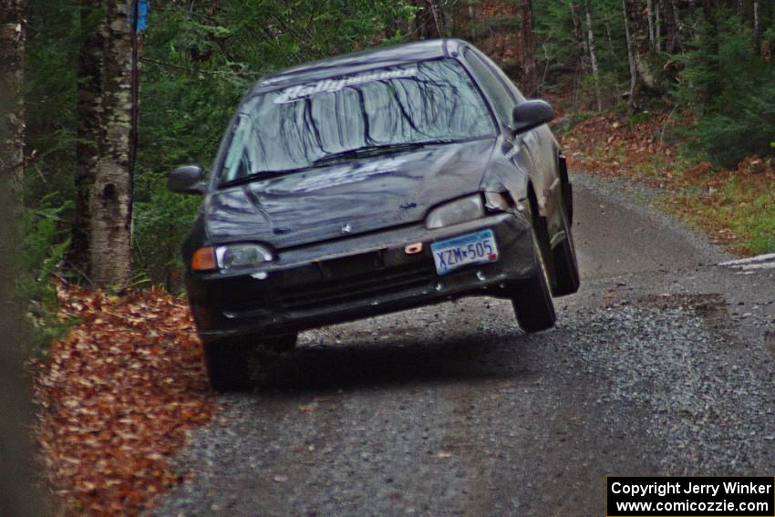 Silas Himes / Matt Himes in their Honda Civic catch air on SS13 (Herman 1)