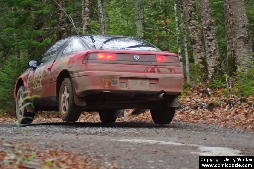 Erik Hill / Oliver Cooper in their Eagle Talon catch air on SS13 (Herman 1)