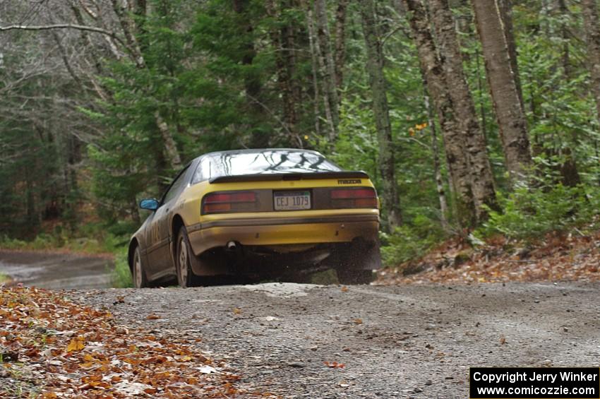 Mychal Summers / Ryan DesLaurier in their Mazda RX-7 on SS13 (Herman 1)