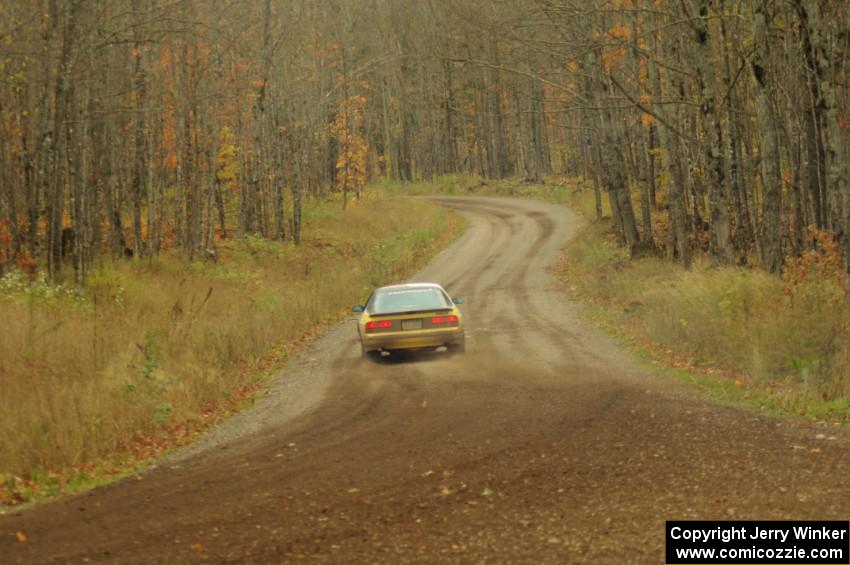 Mychal Summers / Ryan DesLaurier in their Mazda RX-7 on SS16 (Arvon Tower 2)