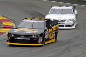 Brendan Gaughan's Chevy Camaro and Alex Bowman's Toyota Camry