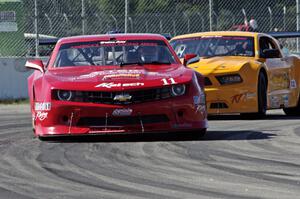 Cameron Lawrence's Chevy Camaro and Dale Madsen's Ford Mustang