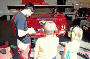 Cameron Lawrence signs an autograph for a young fan.