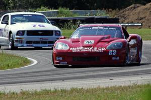 Amy Ruman's Chevy Corvette and Chuck Cassaro's Ford Mustang