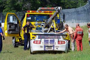 Cliff Ebben's Ford Mustang gets towed back after wrecking the front