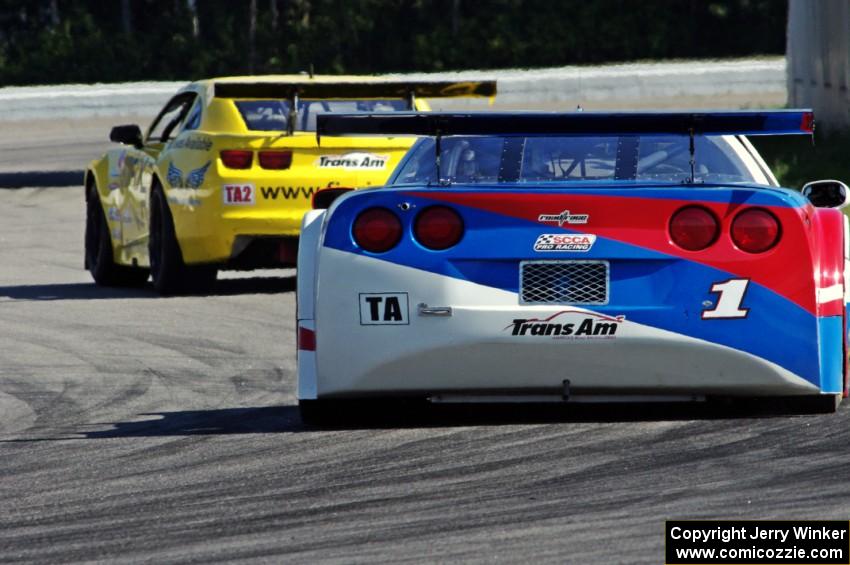 Bob Stretch's Chevy Camaro and Simon Gregg's Chevy Corvette out of turn 12