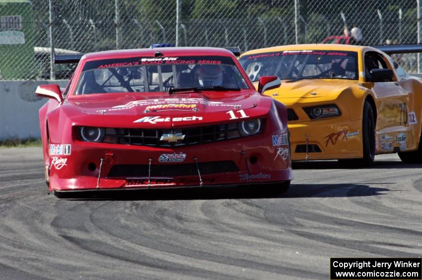 Cameron Lawrence's Chevy Camaro and Dale Madsen's Ford Mustang