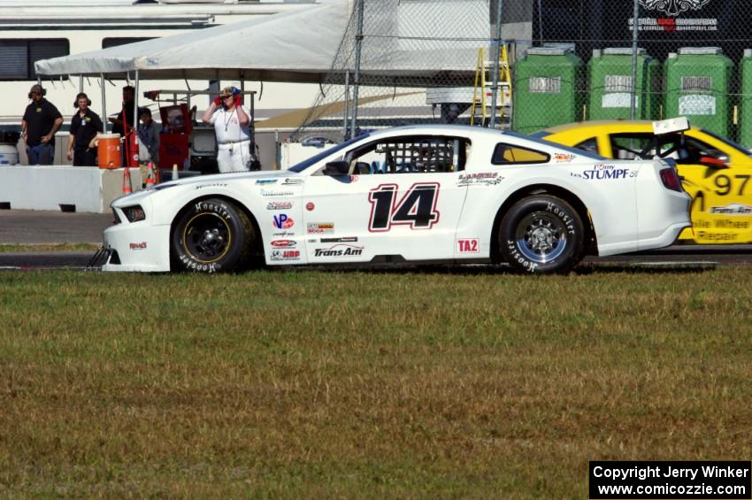 Joe Ebben's Ford Mustang spins backward out of turn 12