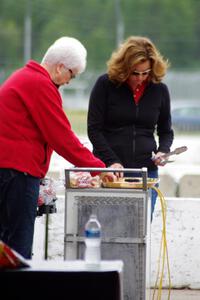 Amy Ruman and her mother grill before the race