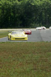 The field comes into turn four on the second lap.