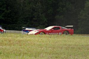 Amy Ruman loops her Chevy Corvette onto the grass between turns four and five