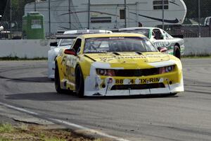 Tom Sheehan's Chevy Camaro, Joe Ebben's Ford Mustang and Scott Ferguson's Pontiac GTO.R