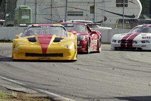 Tony Ave's Chevy Corvette, Amy Ruman's Chevy Corvette and Cliff Ebben's Ford Mustang