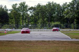 TA2 battle: 1. Cameron Lawrence, 2. Pete Halsmer and 3. Gregg Rodgers, all in Chevy Camaros.