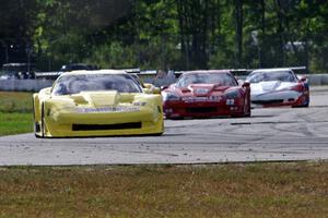 1. Doug Peterson, 2. Tony Ave, 3. Amy Ruman and 4. Simon Gregg, all in Chevy Corvettes.