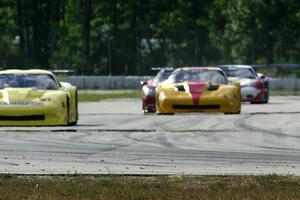 1. Doug Peterson, 2. Tony Ave, 3. Amy Ruman and 4. Simon Gregg, all in Chevy Corvettes.