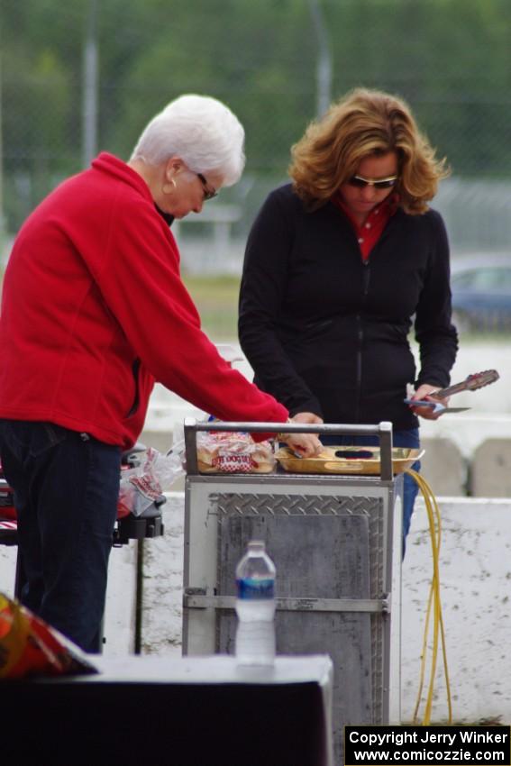 Amy Ruman and her mother grill before the race