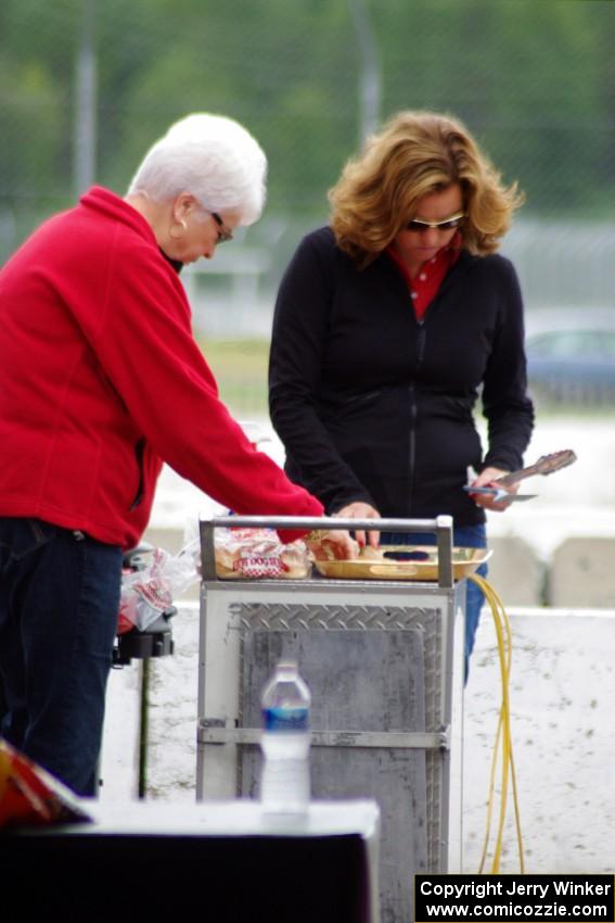 Amy Ruman and her mother grill before the race