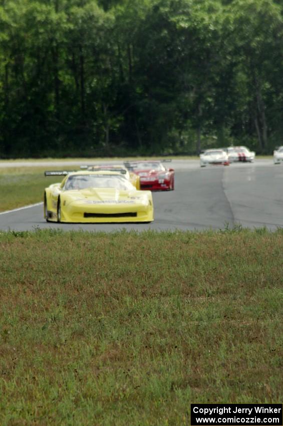 The field comes into turn four on the second lap.