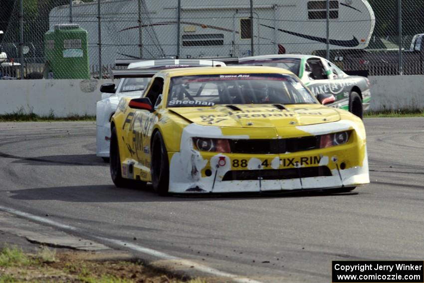 Tom Sheehan's Chevy Camaro, Joe Ebben's Ford Mustang and Scott Ferguson's Pontiac GTO.R
