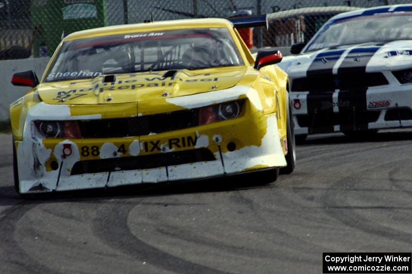 Tom Sheehan's Chevy Camaro and Joe Ebben's Ford Mustang