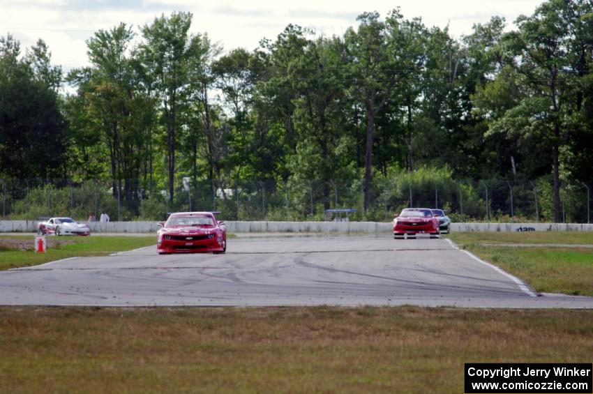 TA2 battle: 1. Cameron Lawrence, 2. Pete Halsmer and 3. Gregg Rodgers, all in Chevy Camaros.