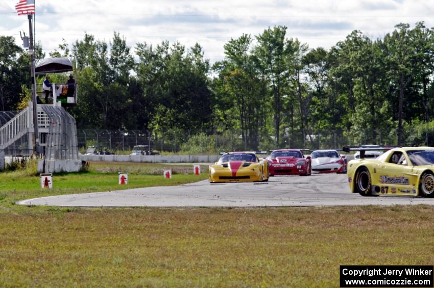 1. Doug Peterson, 2. Tony Ave, 3. Amy Ruman and 4. Simon Gregg, all in Chevy Corvettes.