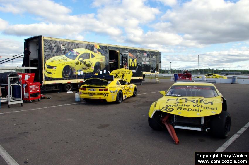 Tom Sheehan's Chevy Camaro and one of the team's spare Chevy Camaros