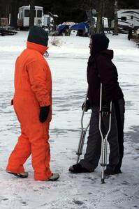 Mary Utecht and Carrie Carlson of Mayhem Racing chat in the pit lane.