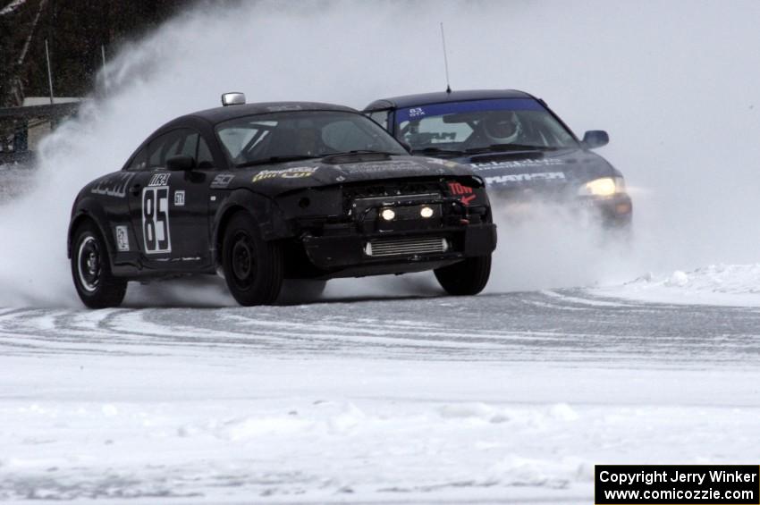 Cody Reinhofer / Chad Reinhofer Audi TT and Mark Utecht / Brent Carlson Subaru Impreza 2.5RS drift onto the front straight.