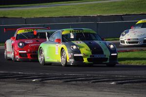 Seth Davidow's, Billy Stevens' and Angel Benitez, Sr.'s Porsche GT3 Cup cars