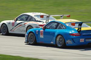 (88) Marco Cirone's and (66) Rob Walton's Porsche GT3 Cup cars battle