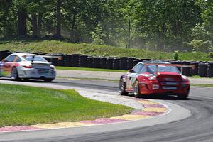 Fernando Peña's and Kasey Kuhlman's Porsche GT3 Cup cars at 6
