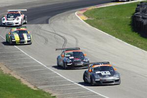 Porsche GT3 Cup cars head uphill to turn 6