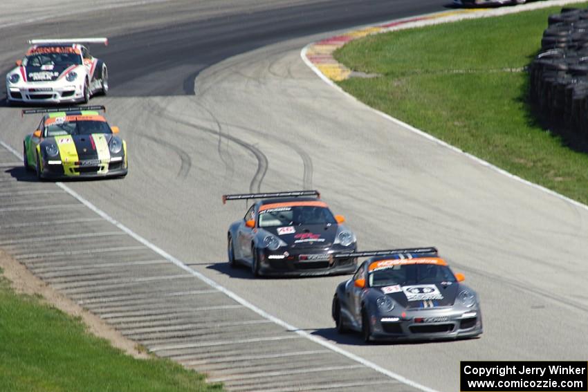 Porsche GT3 Cup cars head uphill to turn 6