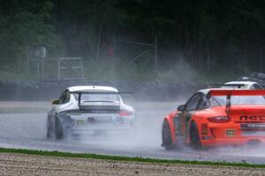 (06) Danny Gianfrancesco and (24) Mark Llano in Porsche GT3 Cup cars in the carousel