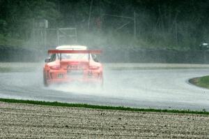 Mark Llano's Porsche GT3 Cup chases another car in the carousel