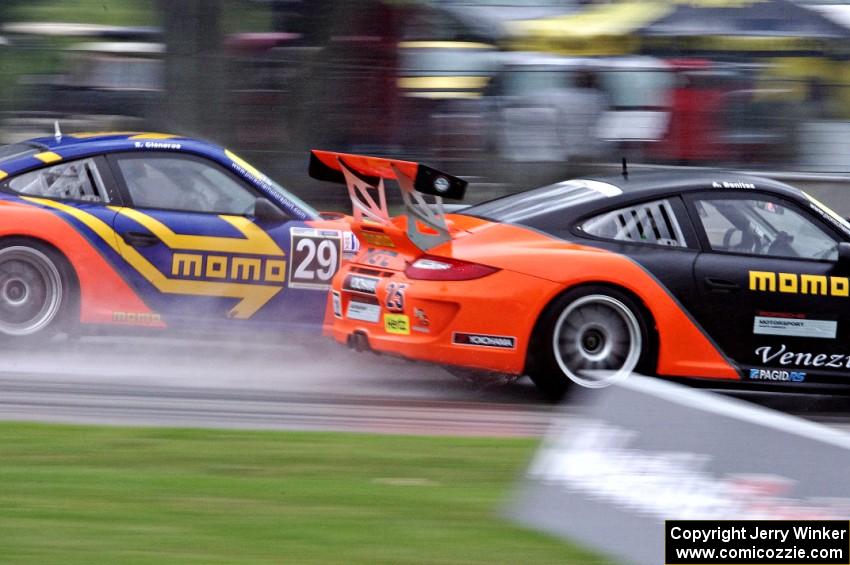 (25) Angel Benitez, Jr.'s and (29) Eduardo Cisneros' Porsche GT3 Cup cars head into turn three