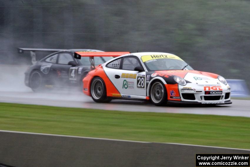 (28) Amadeo Quiros' and (4) Peter Collins' Porsche GT3 Cup cars head into turn three