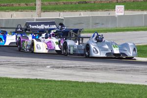 Owen Kratz, Darryl Shoff and Lamont Harris all in Panoz Élan DP-02s, followed by Scott Tucker's West WX10