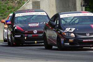 Chad Gilsinger / Michael Valiente Honda Civic Si and Ian Baas / Kevin Gleason VW GTI