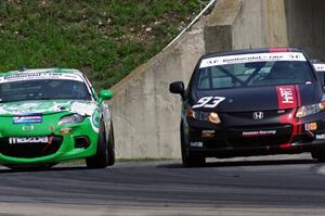 Chad Gilsinger / Michael Valiente Honda Civic Si passes the Tom Long / Derek Whitis Mazda MX-5