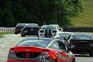 The field keeps its tires warm during a yellow flag