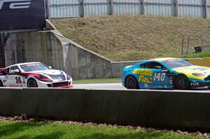 Max Riddle / Kris Wilson Aston Martin Vantage and Bryan Heitkotter / B.J. Zacharias Nissan 370Z