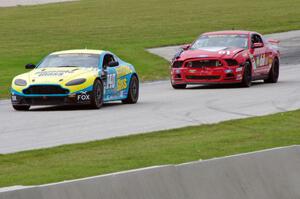 Max Riddle / Kris Wilson Aston Martin Vantage and Billy Johnson / Jack Roush, Jr. Ford Mustang Boss 302R GT